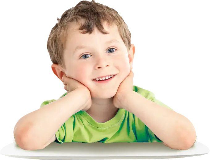 Smiling Young Boy in Green Shirt