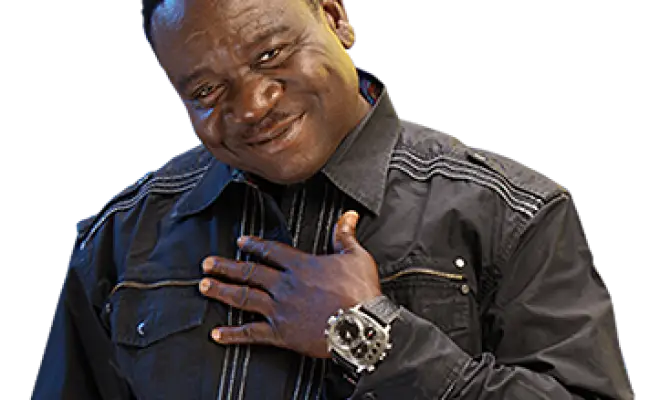 Man in Black Shirt with Friendly Smile