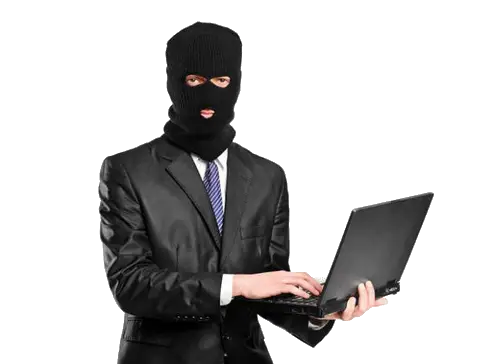 Masked Hacker Operating Laptop