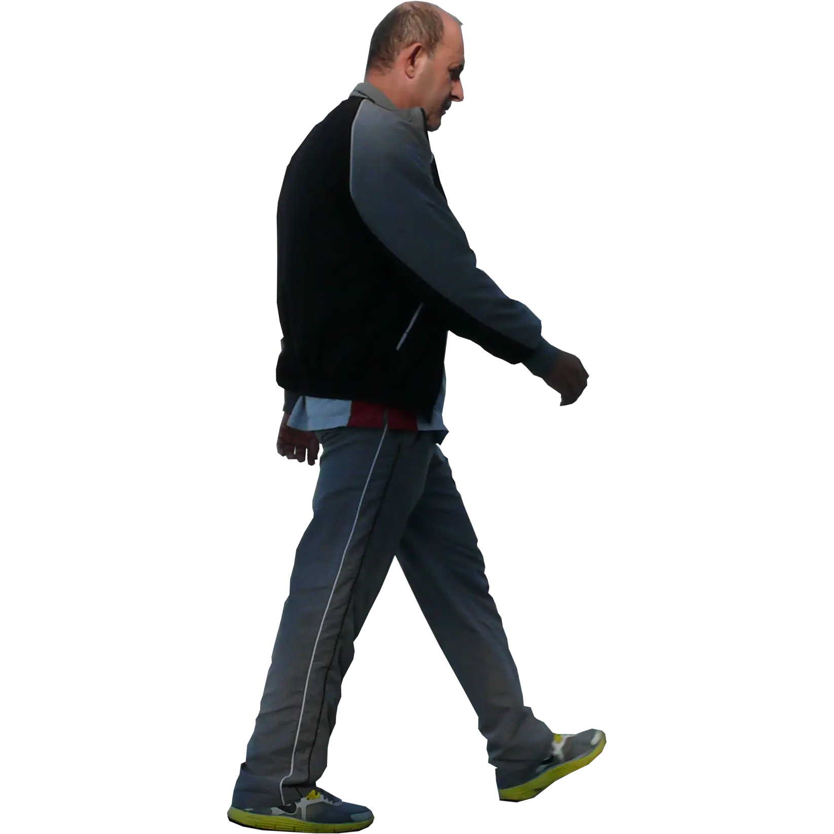 Man Walking Outdoors in Casual Attire