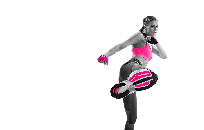 Woman Kicking in Fitness Gear