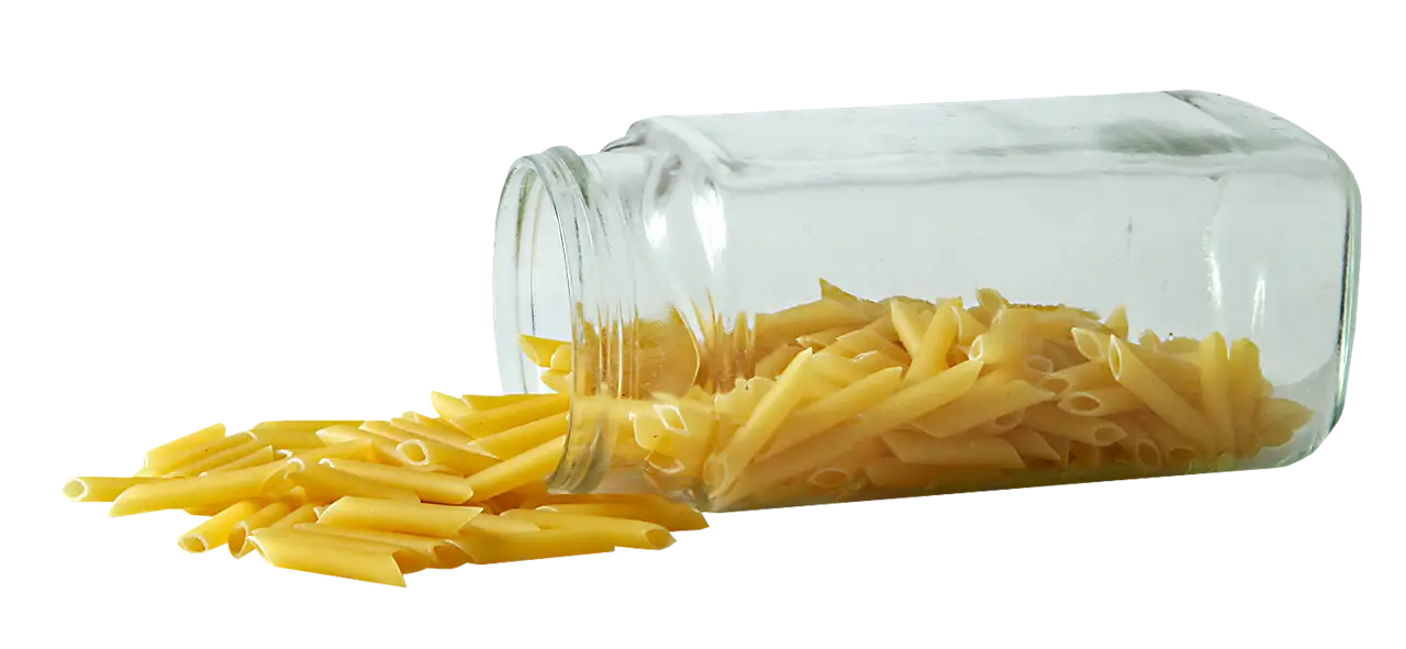 Glass Jar Spilling Pasta Penne