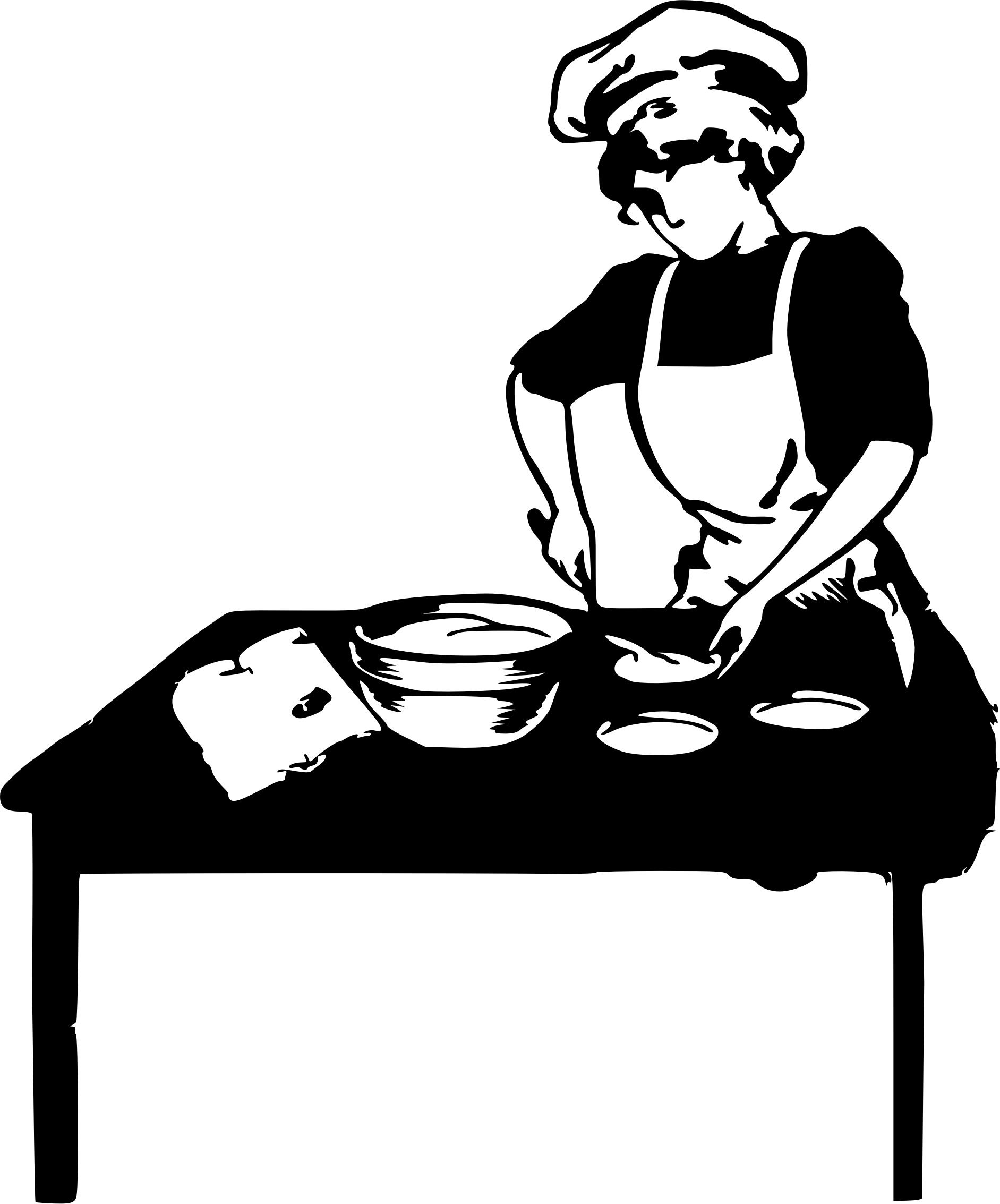 Silhouette of Woman Baking at Table