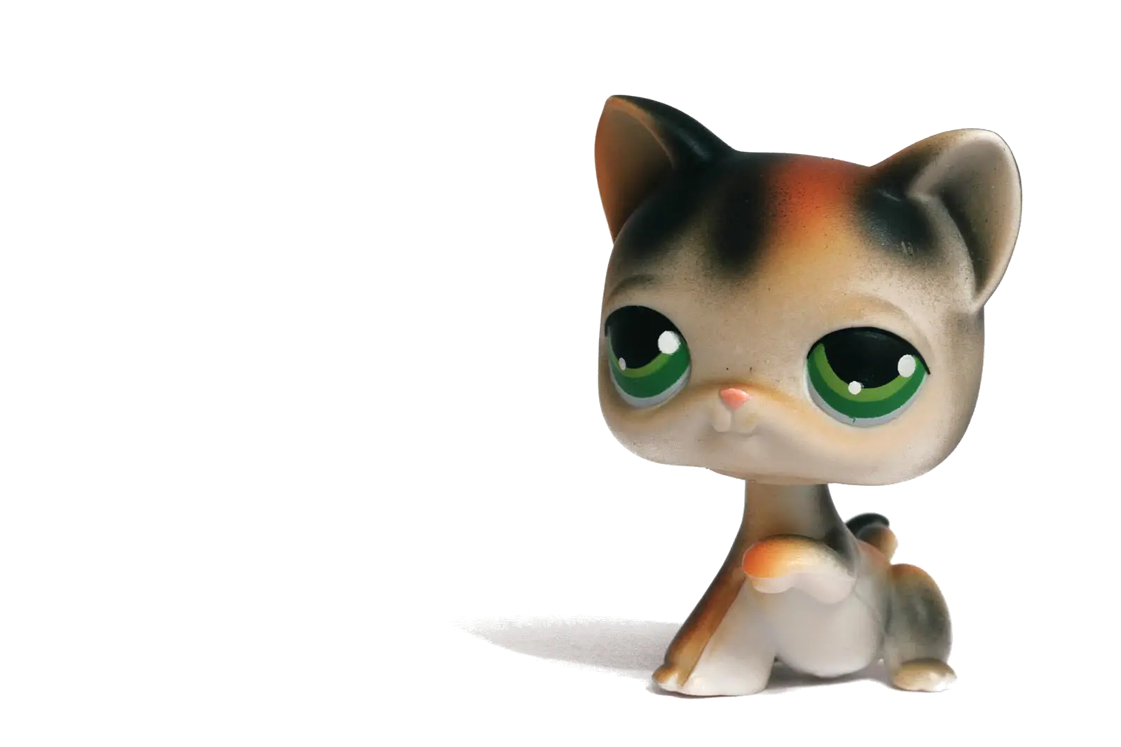 Toy Cat Figurine with Green Eyes