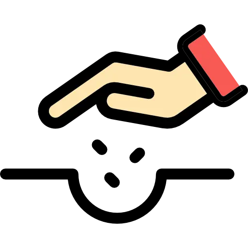 Hand Planting Seeds in Soil