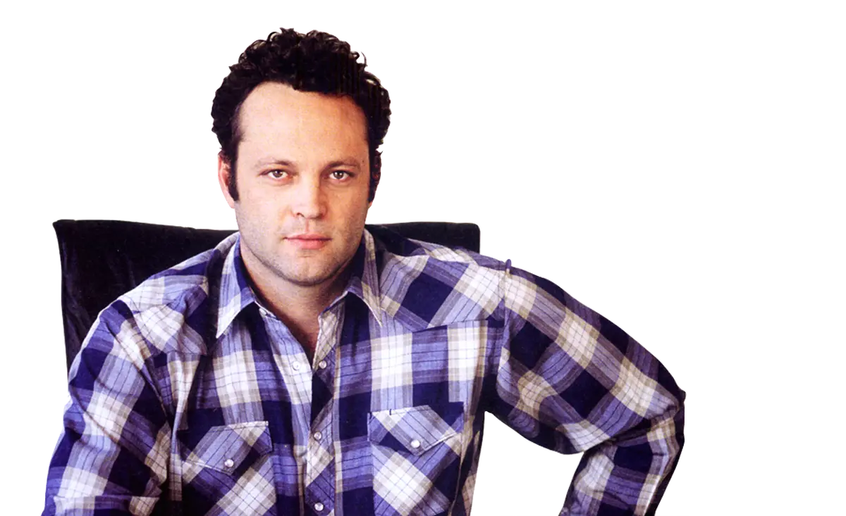Man in Plaid Shirt Sitting