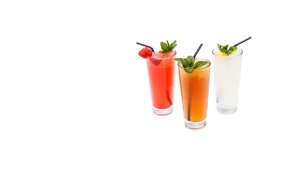 Fruit Juices in Clear Glasses with Mint Garnish