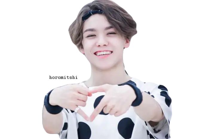 Smiling Person Making Heart Gesture