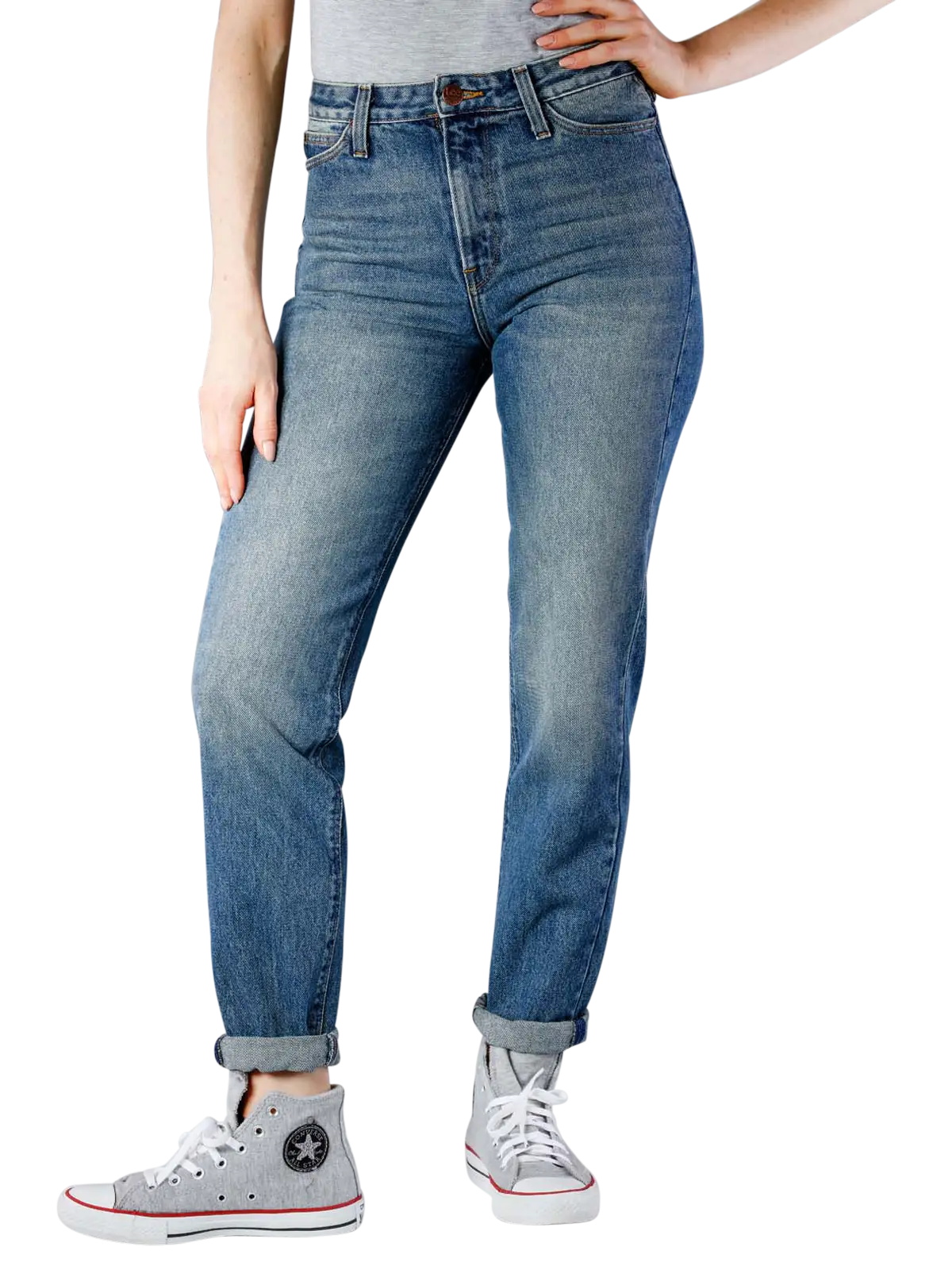 Light Blue Rolled-Up Jeans and Sneakers for Women