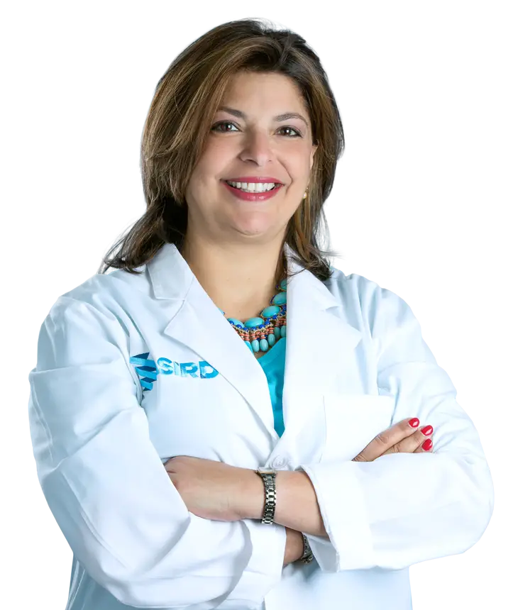 Female Doctor in White Coat with Crossed Arms