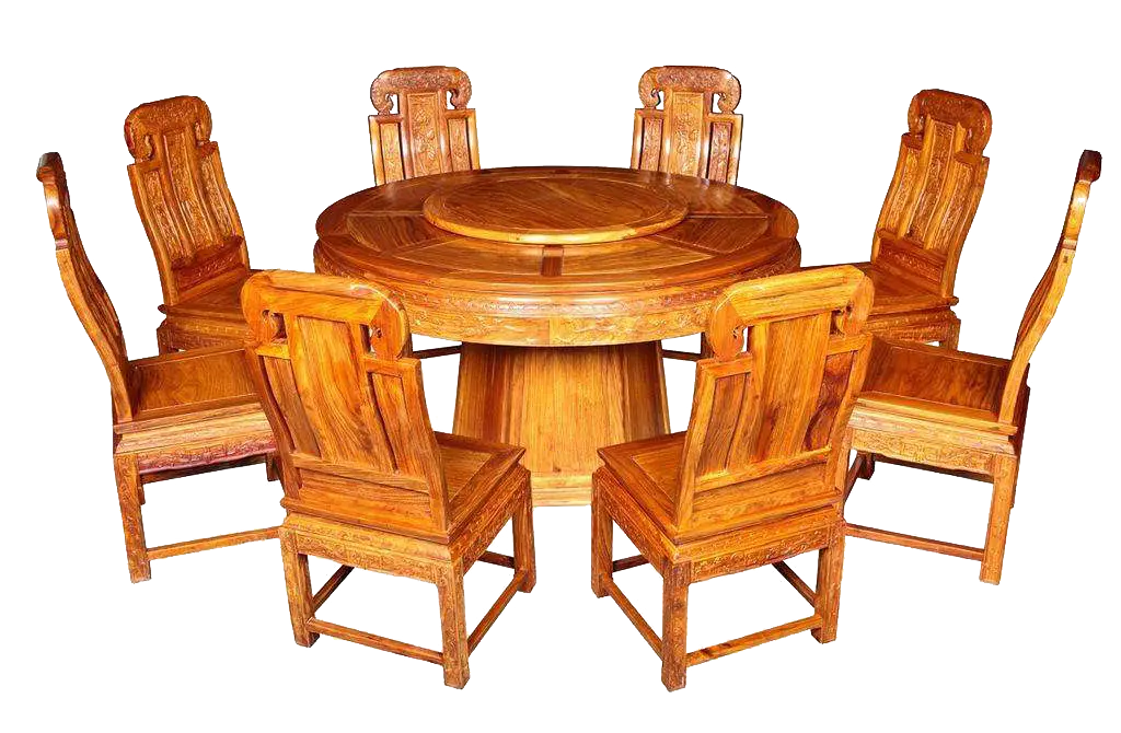 Round wooden dining table with matching chairs