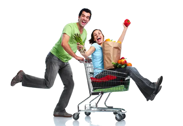 Happy Couple with Shopping Cart Full of Groceries