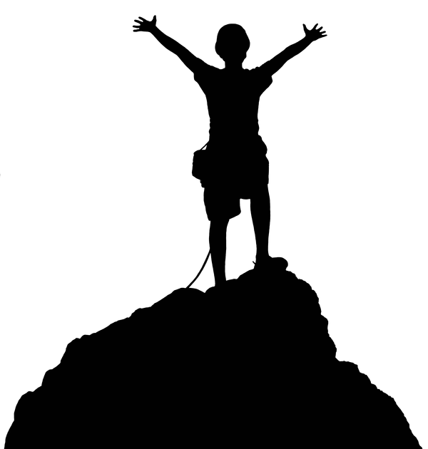 Silhouette of a Climber on a Peak