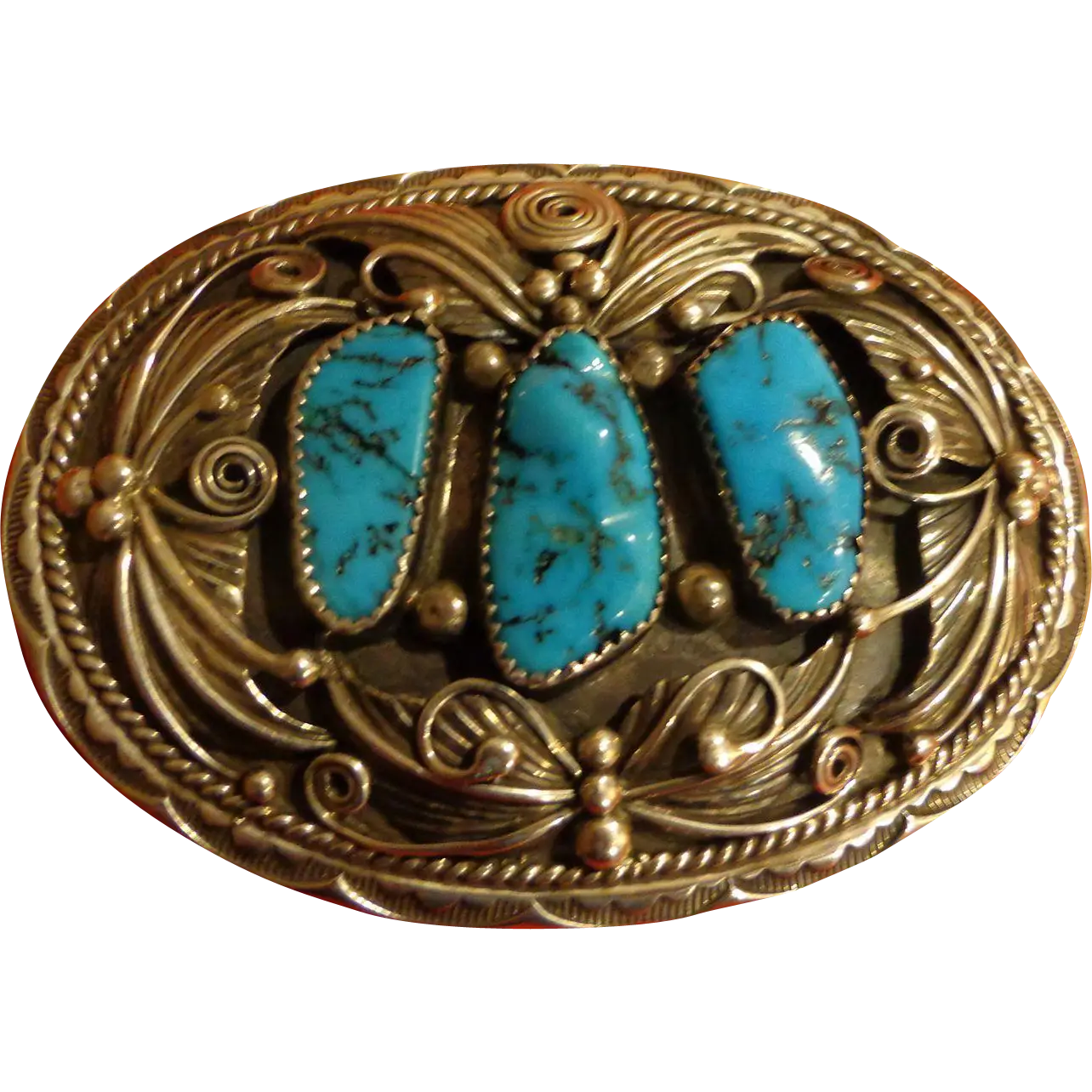 Turquoise Brooch with Gold Detailing