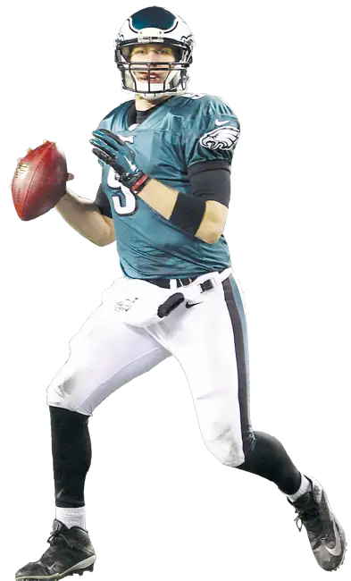 Football Player Holding Ball in Action Pose
