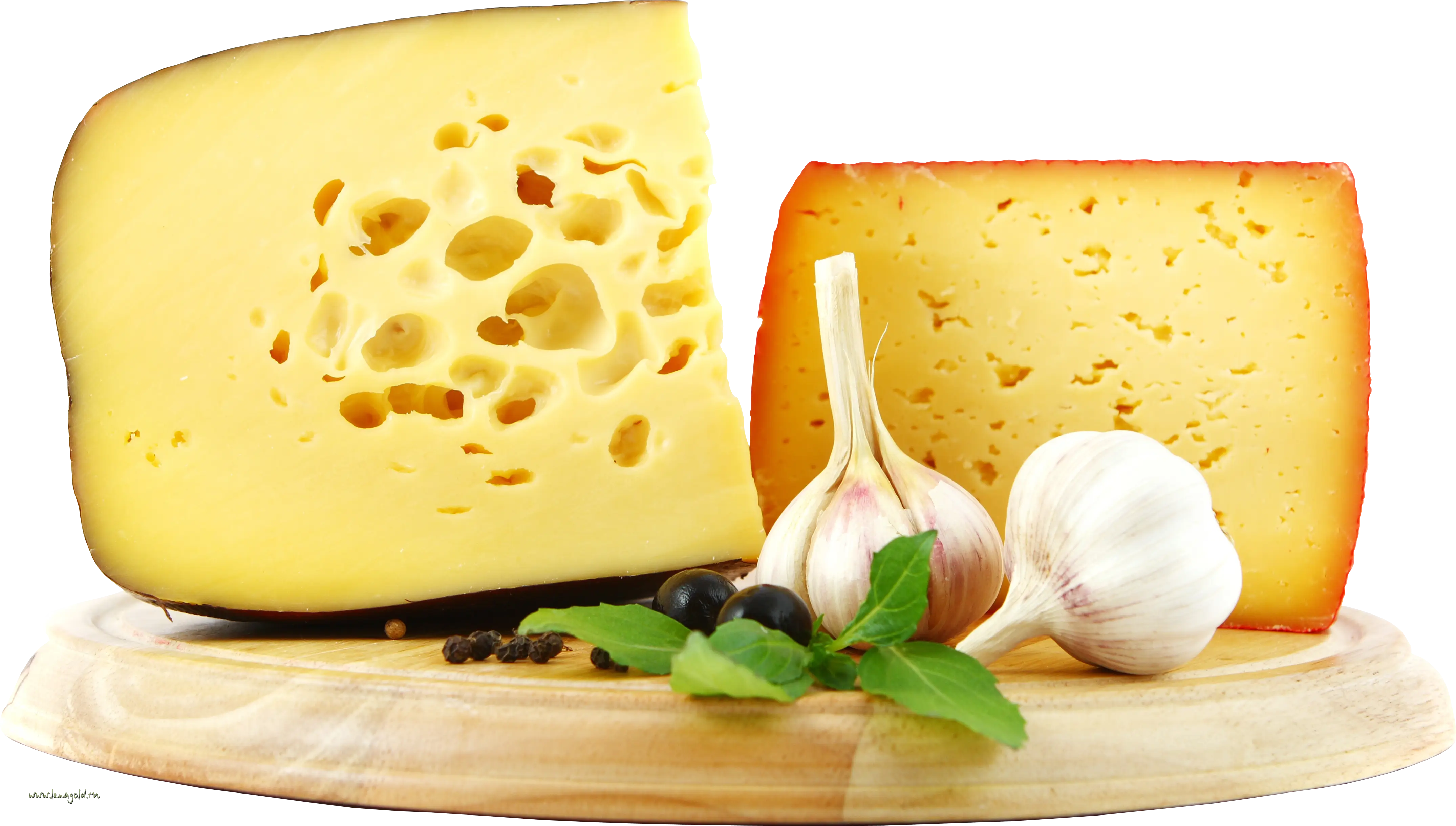 Cheese With Garlic and Herbs on Wooden Board
