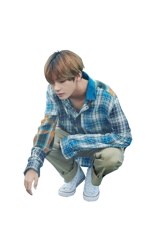 Person Squatting in Casual Outfit