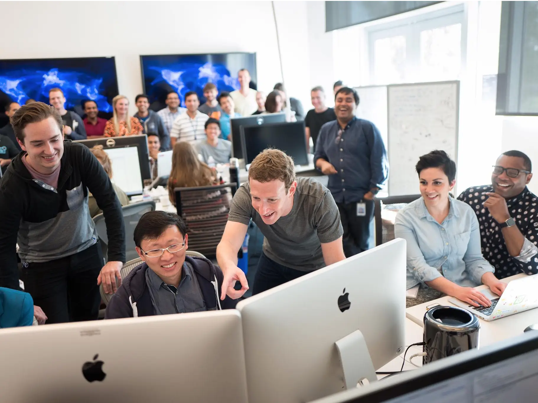 Office Team Collaborating on Computers