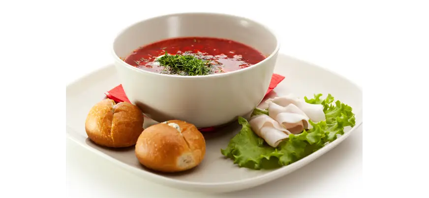 Bowl of Soup with Bread and Garnish
