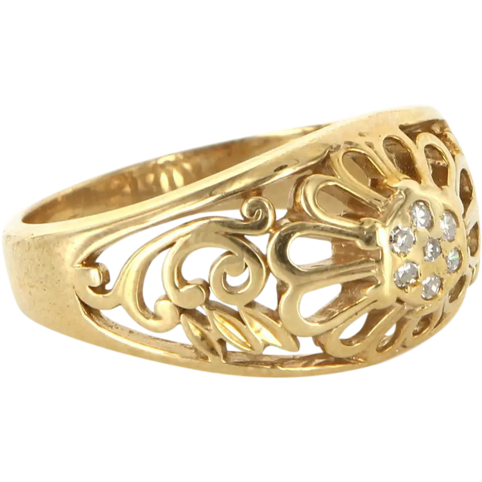 Gold Ring with Floral Design and Diamonds