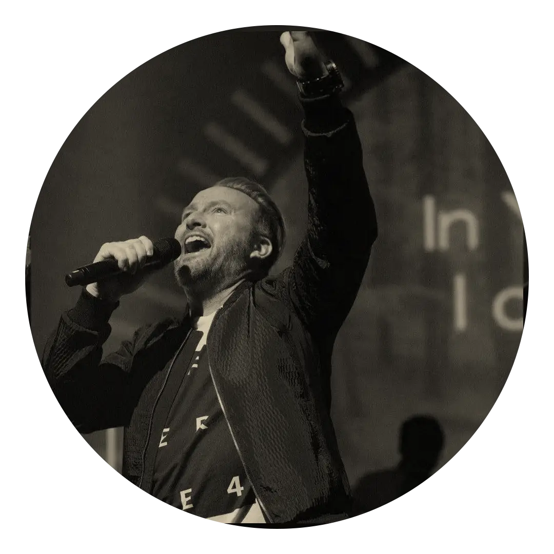 Man Singing on Stage