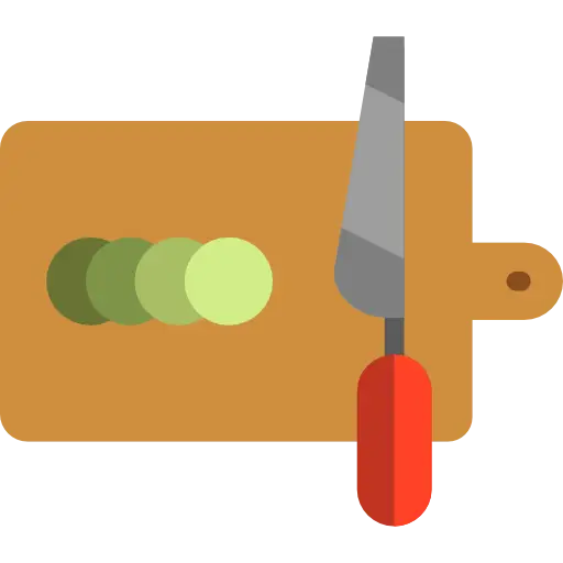 Cutting Board with Knife and Vegetables