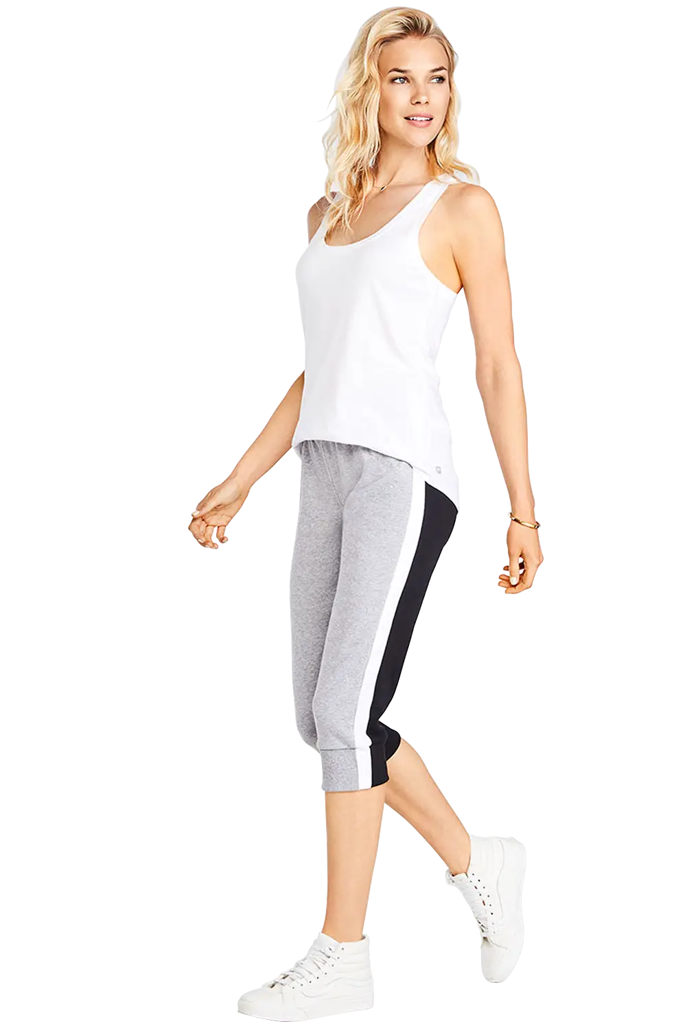 Woman in Casual Outfit with White Tank Top and Grey Pants