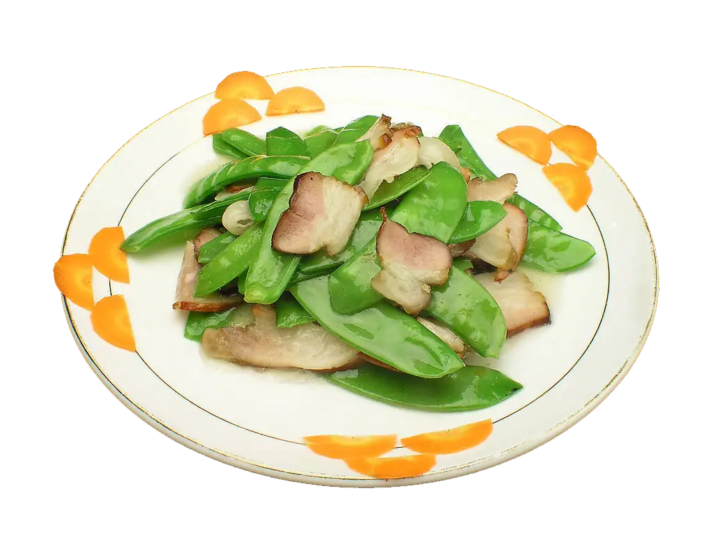 Stir-fried vegetables with bacon on a plate