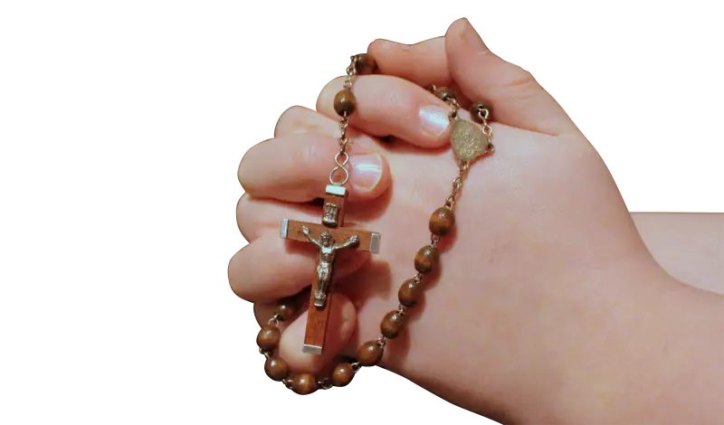 Hand Holding Rosary Beads
